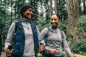 Hikers using the best sunscreen for darker skin, NOZ.